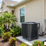 modern high-efficiency AC unit in Florida home exterior, photorealistic, professional